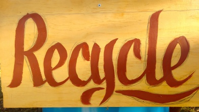 They needed "Recycle" signs so I found a piece of wood then Hand wrote and painted on the spot.