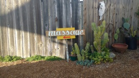 They needed "massage" signs so I found a piece of wood then Hand wrote and painted on the spot.